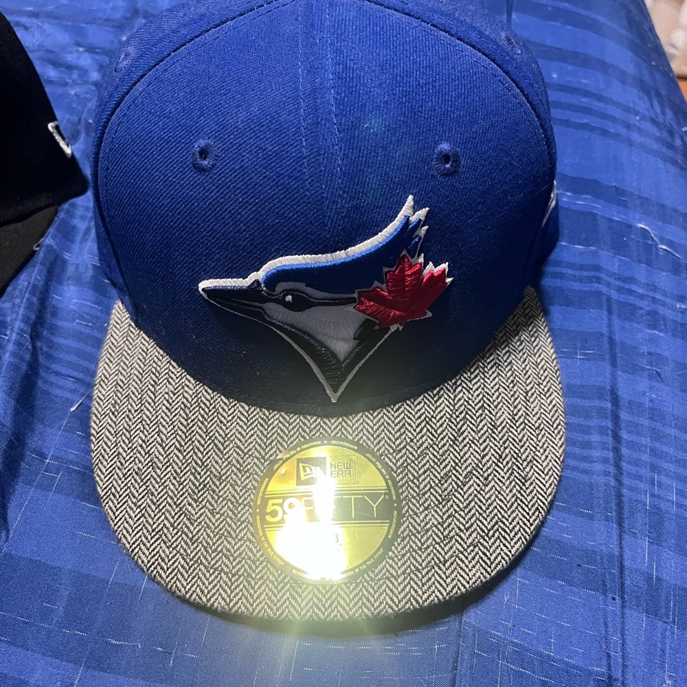 New Era Blue and Black Cap